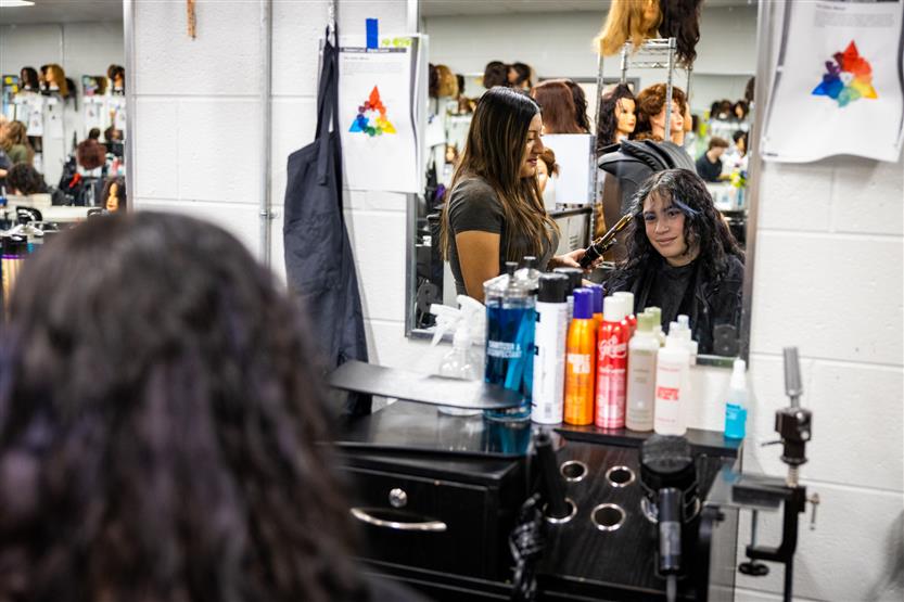 Centennial High students in the cosmetology class